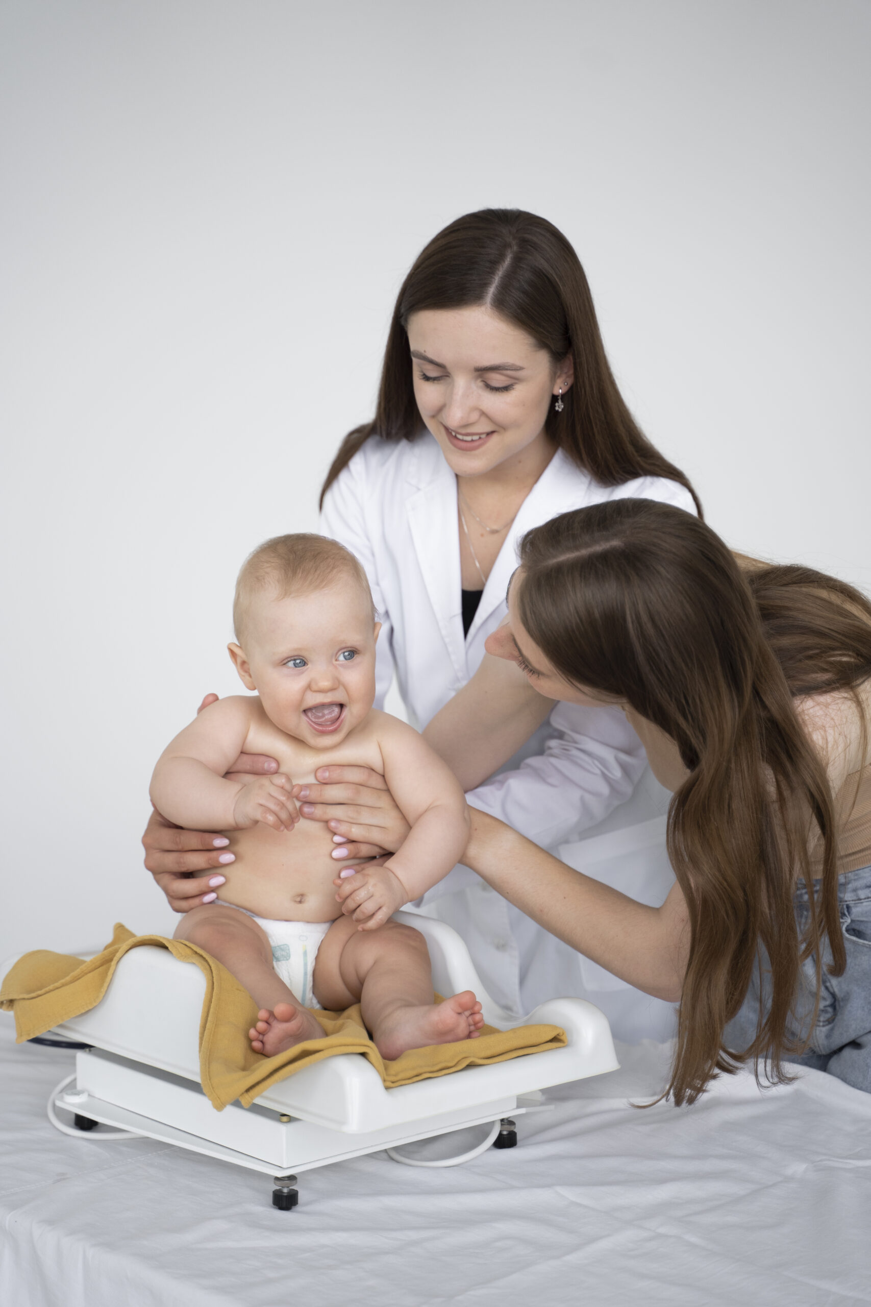 adult taking care baby weight 2 scaled.jpg
